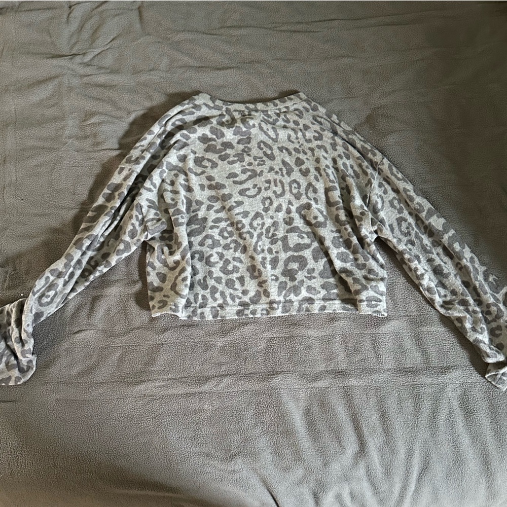 Size medium animal print grey long sleeve shirt from Forever 21.